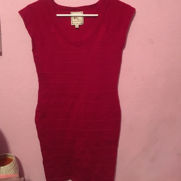 Red body con dress