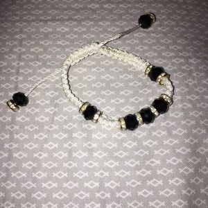 Adjustable black gold and white bracelet