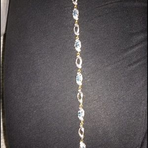 Gold plated with blue stones