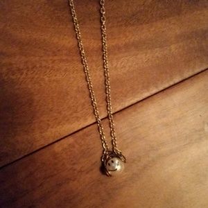 Pearl smiley face wearing headphones necklace