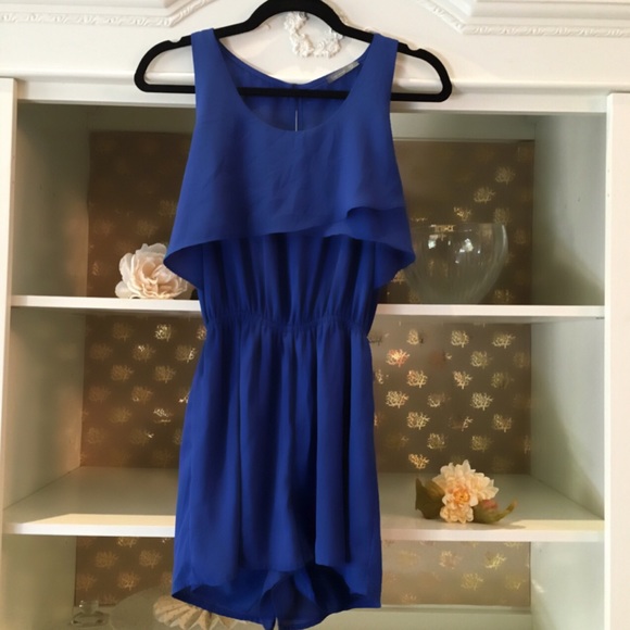 Blue semi-sheer romper w/ exposed back
