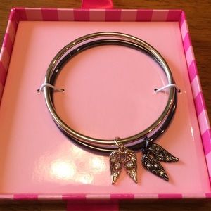 Pewter and gold VS promo wing bracelets