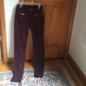 Burgundy zip skinny jeans