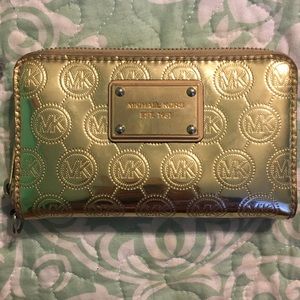 Gold Micheal Kors wristlet (missing the strap)