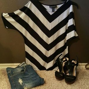 INC open shoulder sparkly silver and black strip