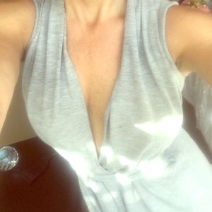 Grey sleeveless cardigan sweater