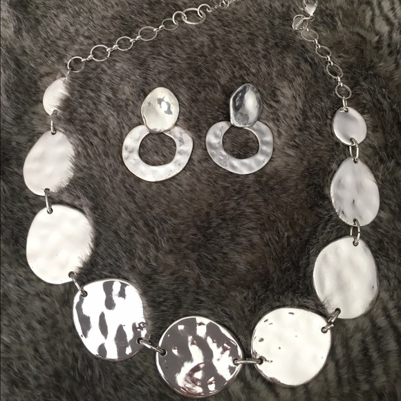 Necklace and pair of earrings