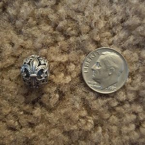 Fleur-de-lis charm