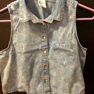 Black pocket sleeveless button down