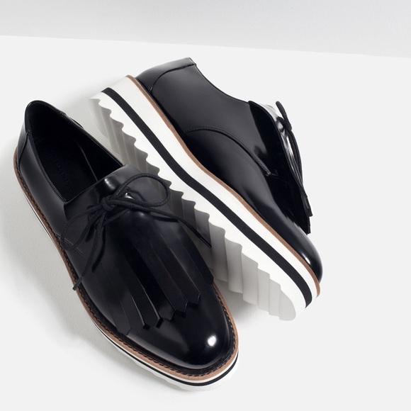 FRINGED FLATFORM SHOES