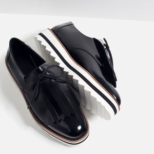 FRINGED FLATFORM SHOES