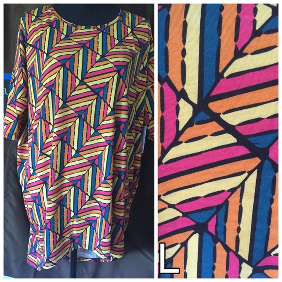 Irma tunics size down 1 or 2 sizes. Tops run big - Picture 2 of 3