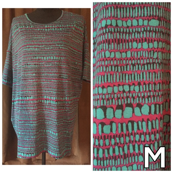 Irma tunics size down 1 or 2 sizes. Tops run big - Picture 3 of 3