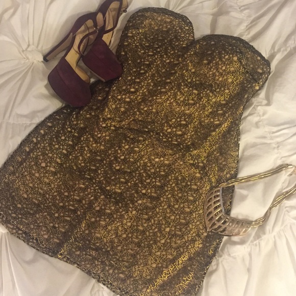 Black and gold strapless sweetheart dress