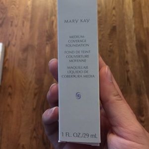 Beige 305 medium coverage liquid foundation