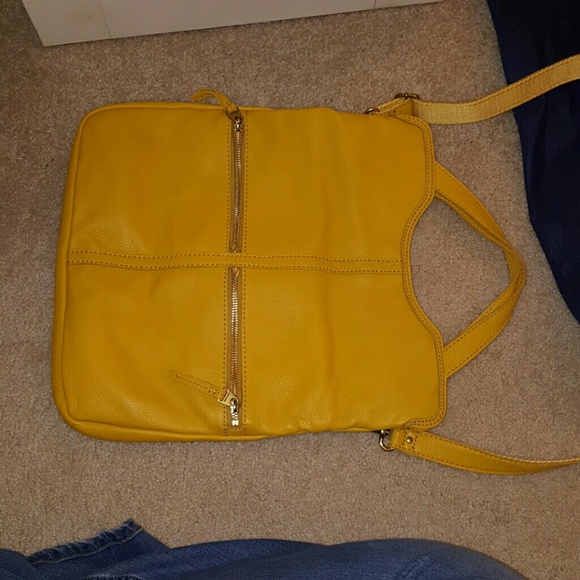 Fossil fold over handbag