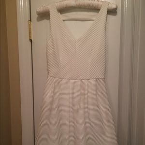 White low v neck v back dress