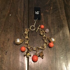 Saks Fifth Avenue gold bracelet with dangles