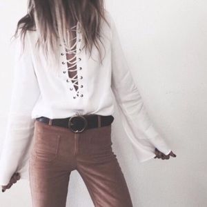 White lace up bell sleeve blouse top