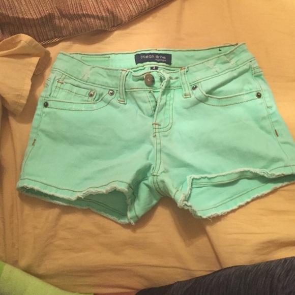 Green denim shorts