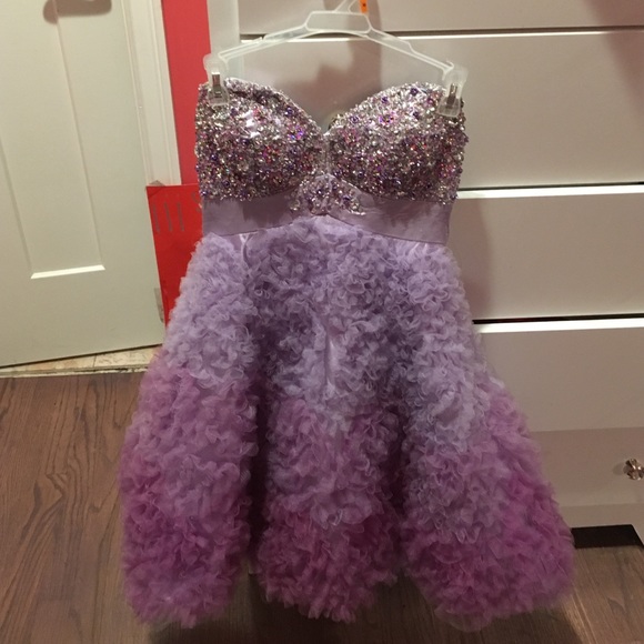 A sequined purple ruffle dress