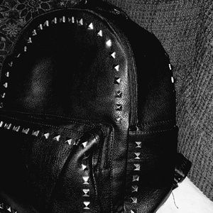 Never used black "leather" backpack