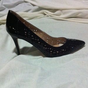 Bnwt black pumps with small cutout details.