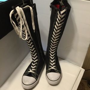 Lace up tennis shoes