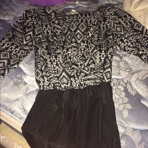 Long sleeve romper. Shorts at bottom