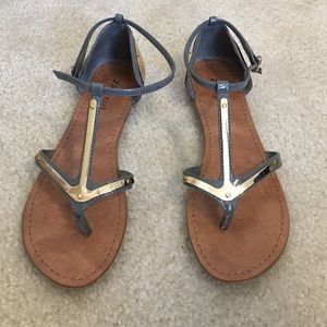 Gray and gold sandals