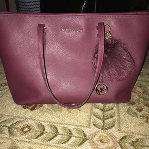 Like new cranberry colored authentic MK BAG