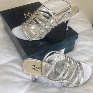 High heel strappy sparkly sandals.