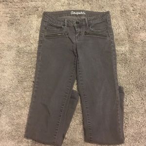 Dark grey jeans with zipper detail