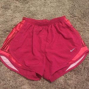Pink and orange Nike shorts