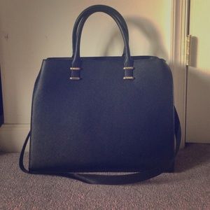 MUST GO: Black Classic Handle Bag