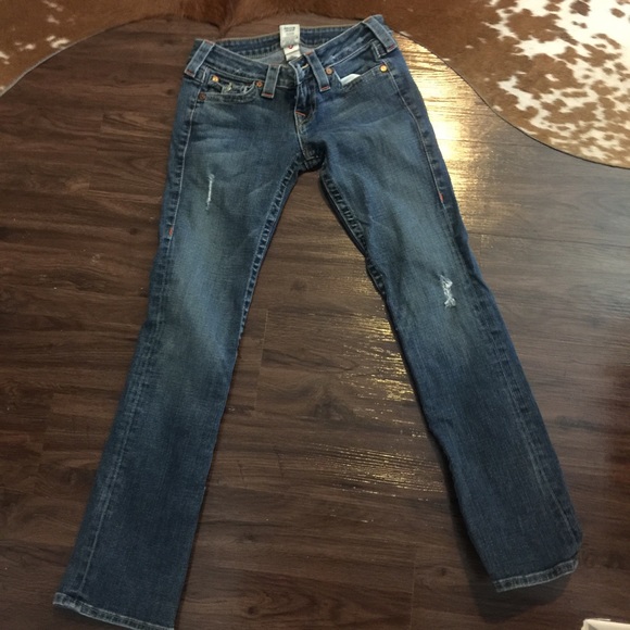True Religion jeans- tear in back.  See pics