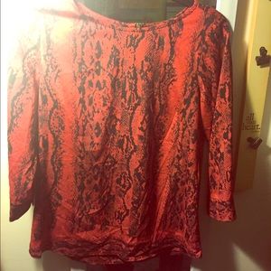 Flowy red and black patterned blouse