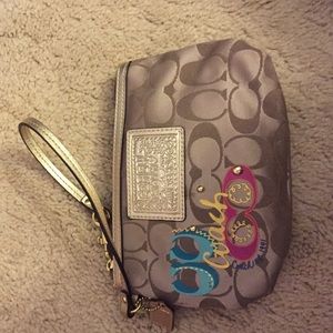 2 coach Wristlets for sale
