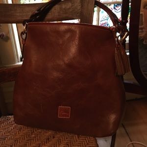 Dooney & Bourke slouchy florentine vachetta.