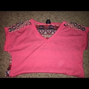 Pink V neck with tribal back.