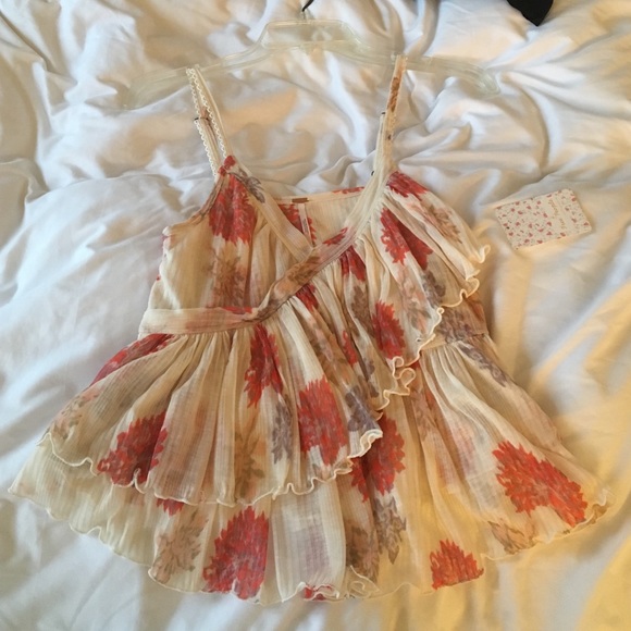 Never worn Free People tank top with tags
