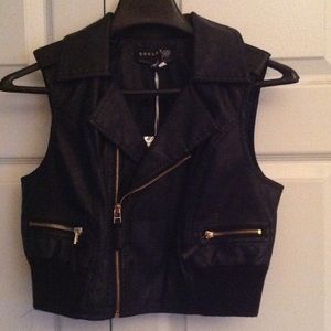 Black motorcycle vest with gold zippers. NWT.