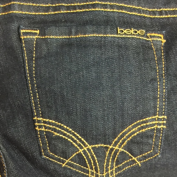Bebe dark blue skinny ankle jeans with zippers