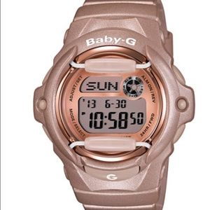 A rose gold baby g-shock watch