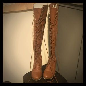 Like new. Over the knee laceup boots w side zip.