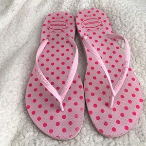 Pink polka dot flip flops