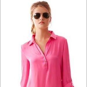Lilly Pulitzer pink blouse with gold buttons.