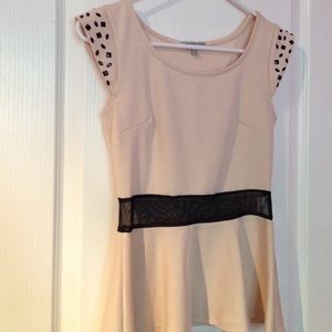 Cream and black peplum tank top