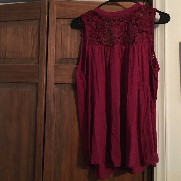 Red sleeveless blouse