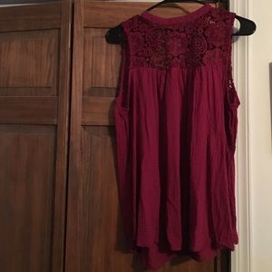 Red sleeveless blouse